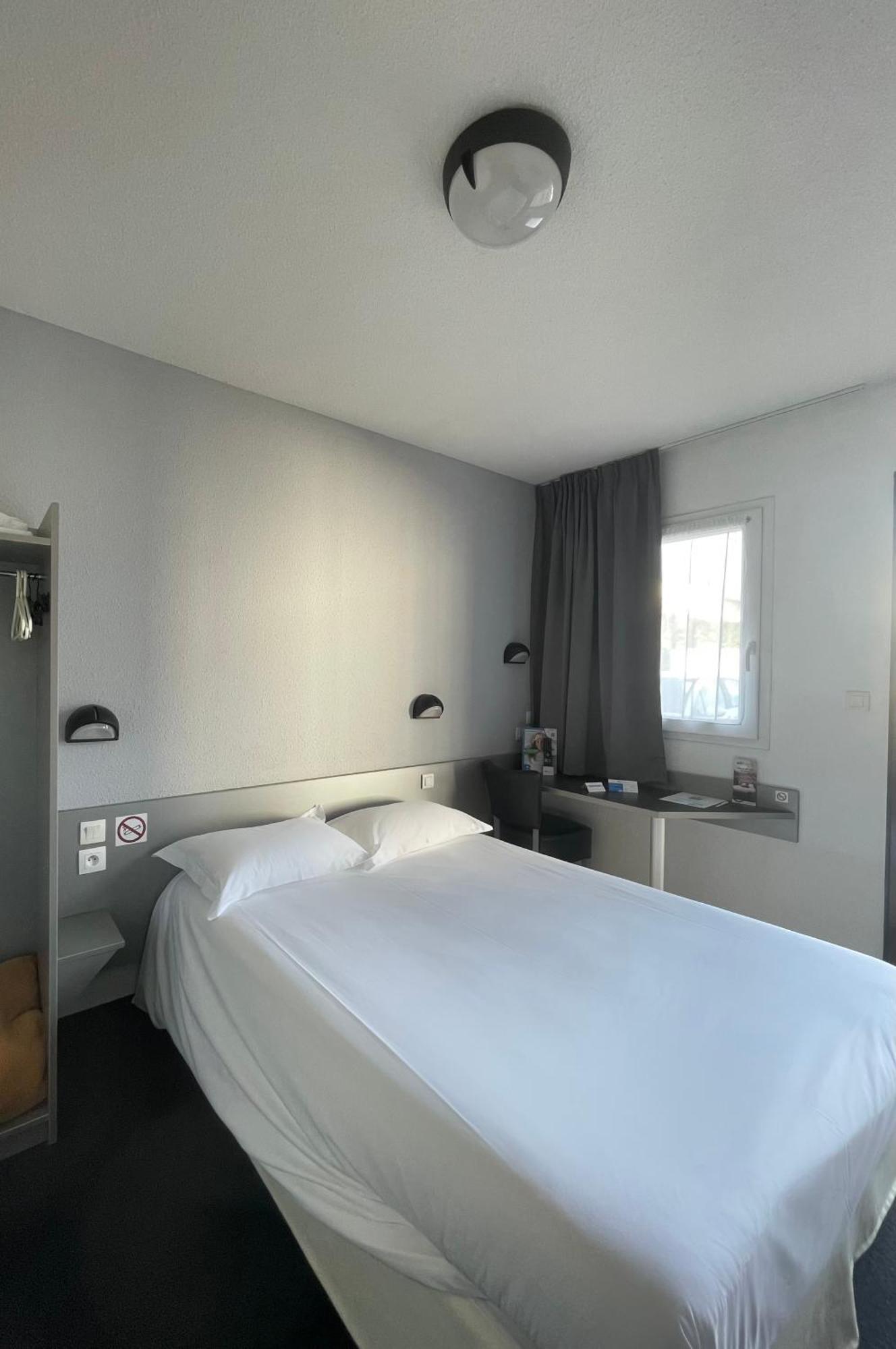 Brit Hotel Marvejols Quarto foto